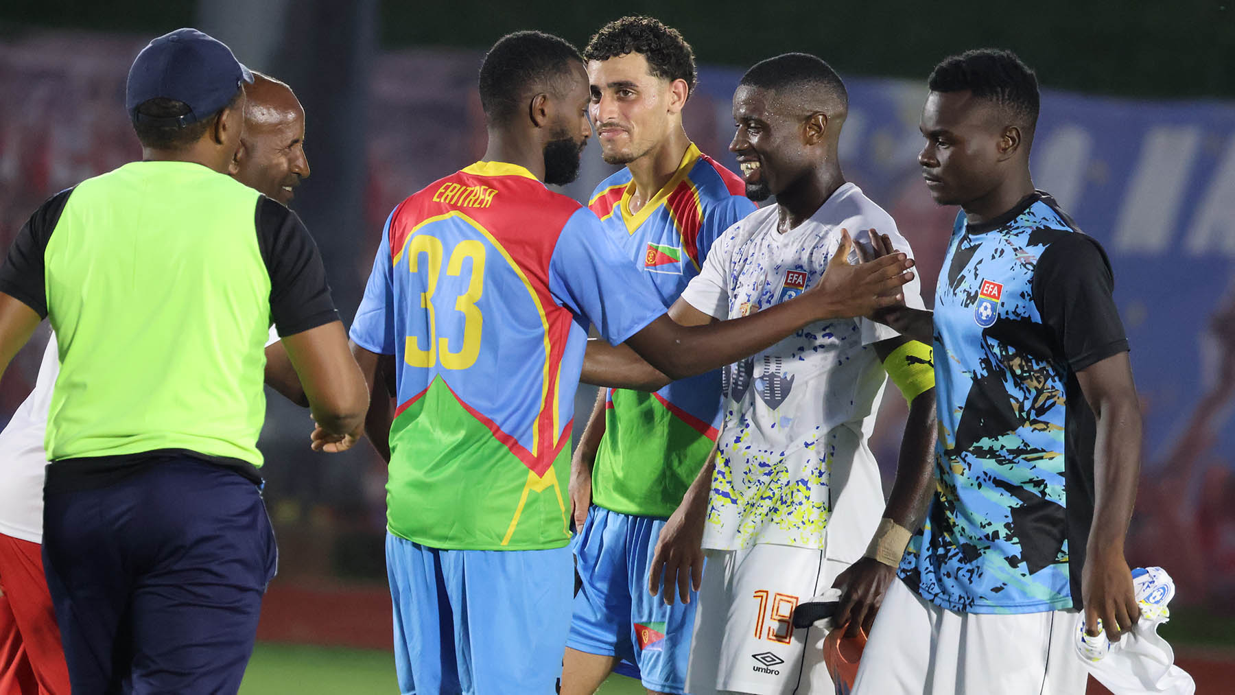 Eritean players, officials and Sihlangu captain Lindo 'Bhabhalazi' Mkhonta with Innocent Pakule sharing a light moment after the game. 